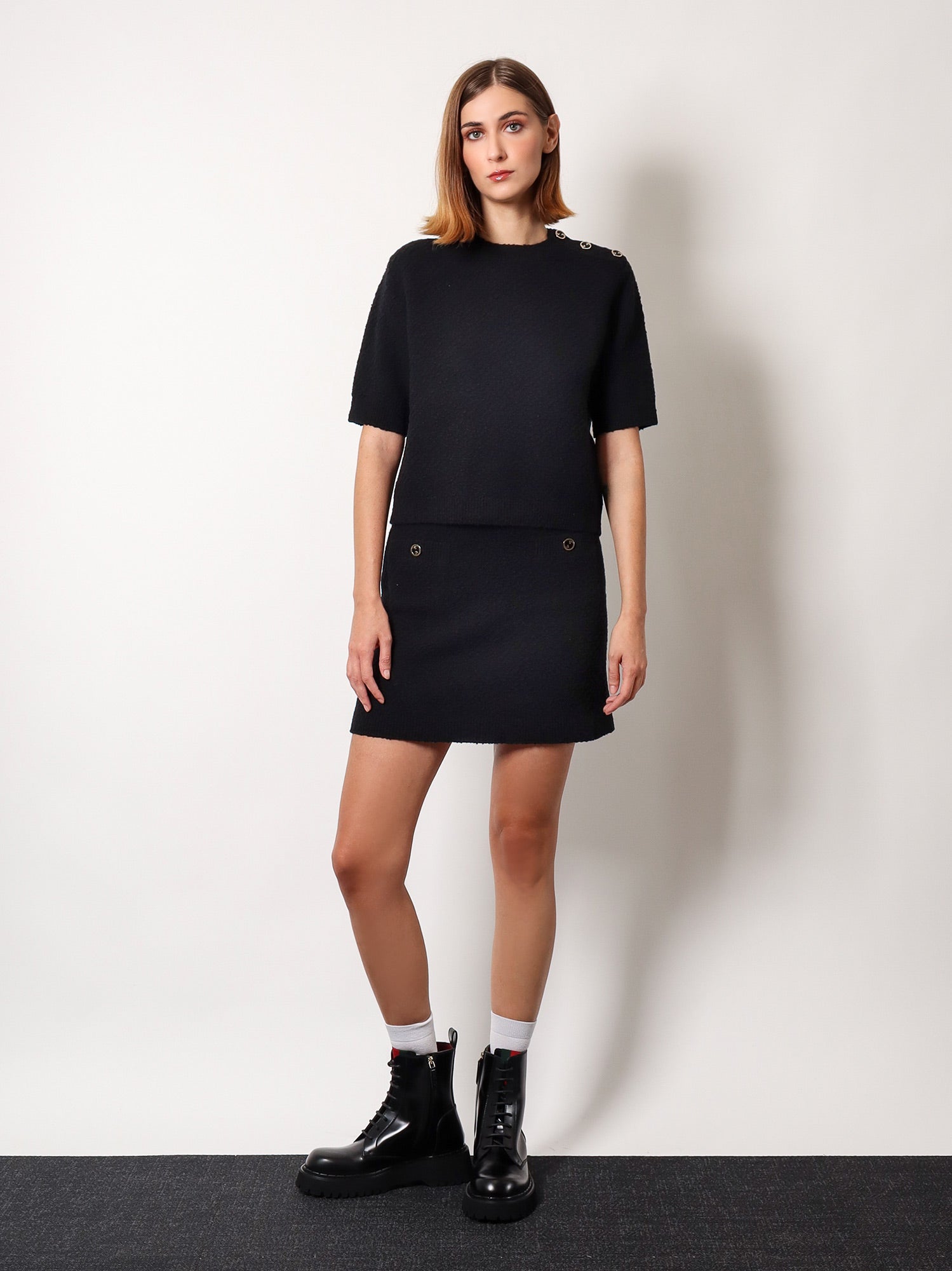 'Wool skirt with bouclE effect, mini lenght and pockets with ribbed profiles and gg enamelled buttons'